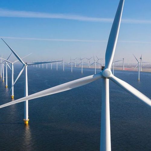 Aerial view of wind turbines at sea, North Holland, Netherlands